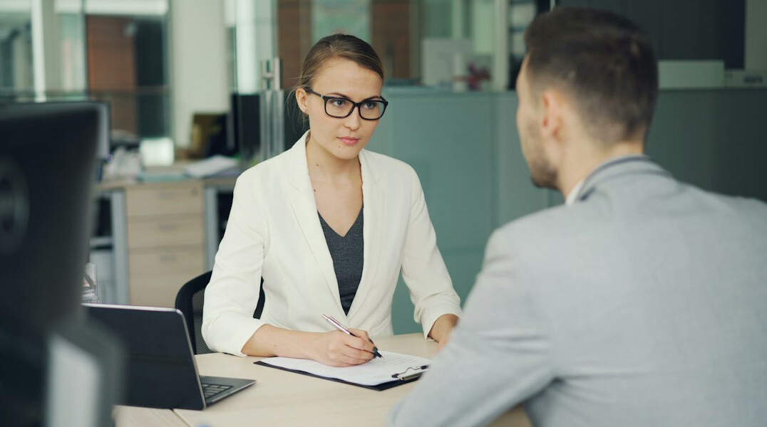 health insurance advisor with client