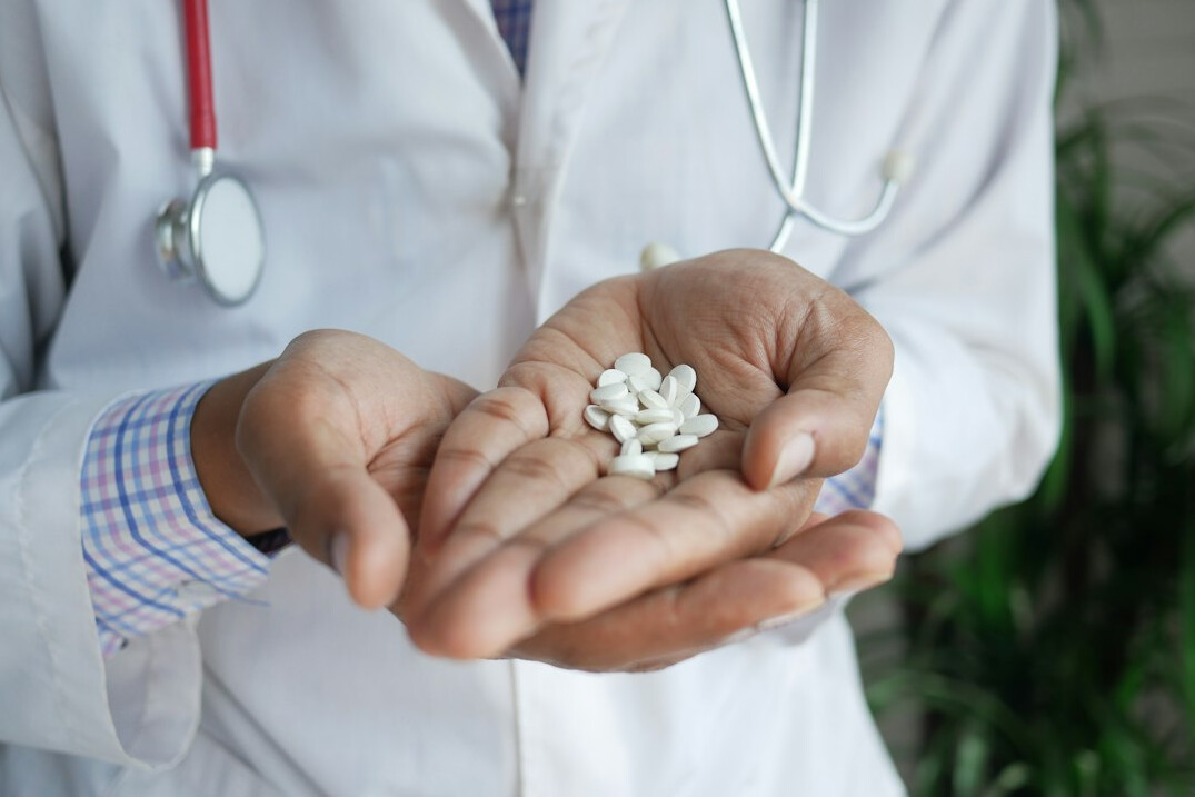 Female doctor holding a tablet in a clinic