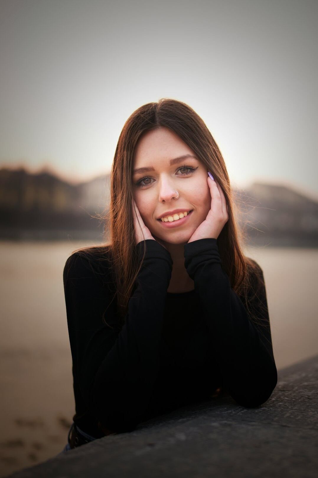 Portrait of a young woman with a confident smile